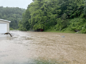 Heavy rain floods creeks, roads and basements
